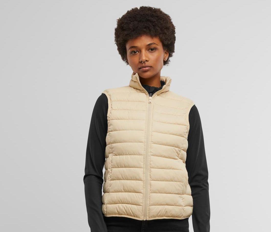 NEW MORNING STUDIOS Ladies Light Puffer Vest bedrukken met eigen logo